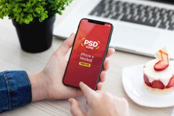 Male Hand Holding iPhone X PSD Mockup