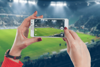 Free Smartphone Plus Football Stadium Scene Mockup
