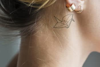 Free Woman Plus Ear Tattoo Mockup in PSD