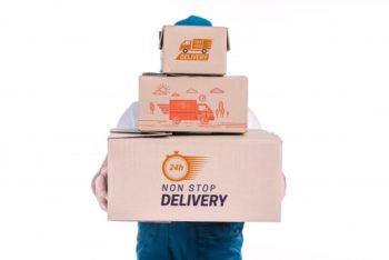 Free Delivery Boxes Plus Delivery Man Mockup in PSD