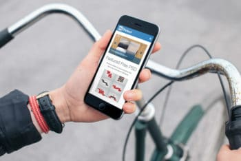 Free Cyclist Plus iPhone Scene Mockup in PSD