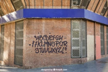 Free Realistic Brick Wall Graffiti Mockup in PSD