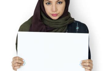 Free Arab Woman Holding Blank Board Mockup