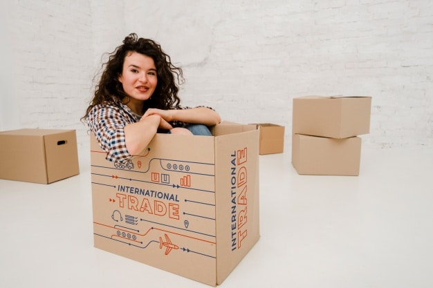 Woman Plus Big Cardboard Box
